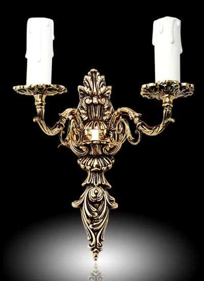 Бронзовые бра (28 фото): бронзовые настенные светильники в античном стиле в виде свечи