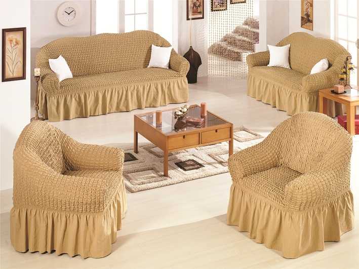 Чехлы на диваны и кресла (60 фото): безразмерные на резинке, натяжные модели на угловой и для мешка, съемные на мебель без подлокотников, отзывы