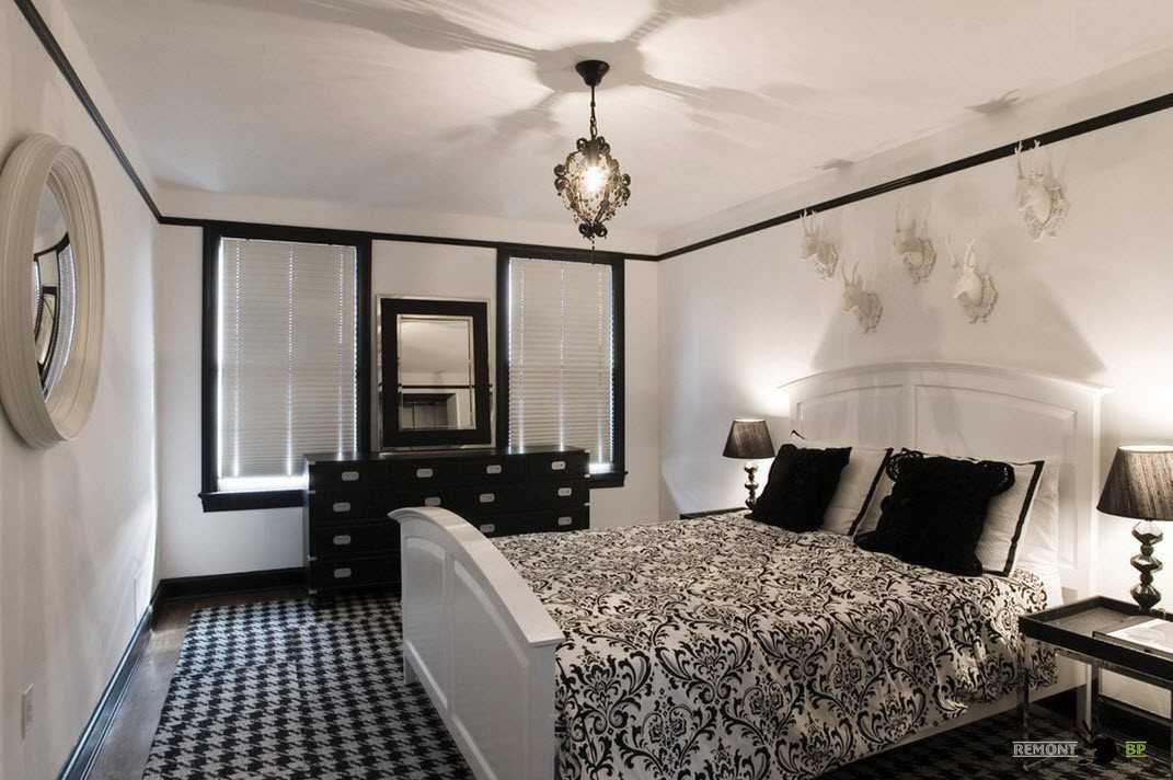 Черная кровать может стать эффектным и привлекательным элементом дизайна интерьера спальни Как сформировать гармоничный интерьер спальни с кожаной и глянцевой кроватью черного цвета Из каких материалов изготавливается такая мебель